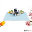 Delfinpaar mit Palmen am Strand - Kartenfarbe Weiß - 15 x 20 cm